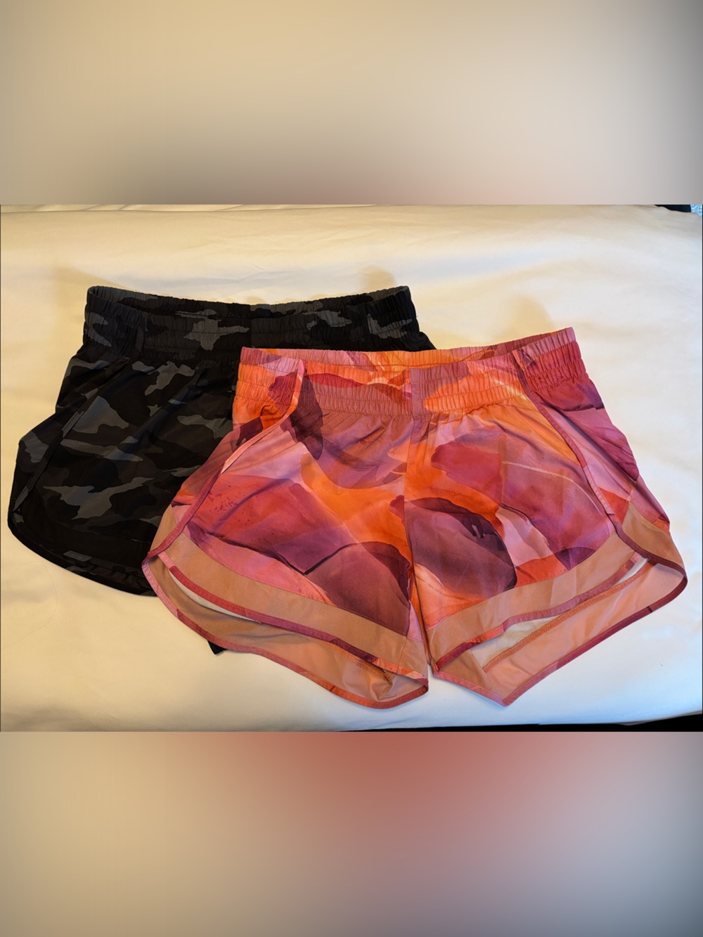 Athleta Women's 2-Pack running Shorts - Black Camo & Pink Orange Print S